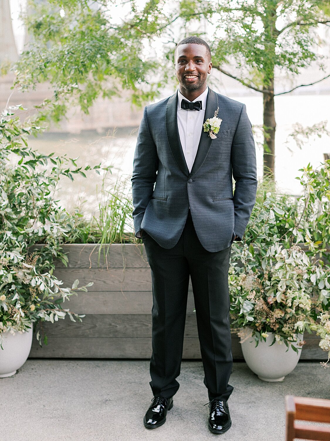 groom stands at altar for Celestine wedding | Asher Gardner Photography | Intimate Ceremony in DUMBO New York