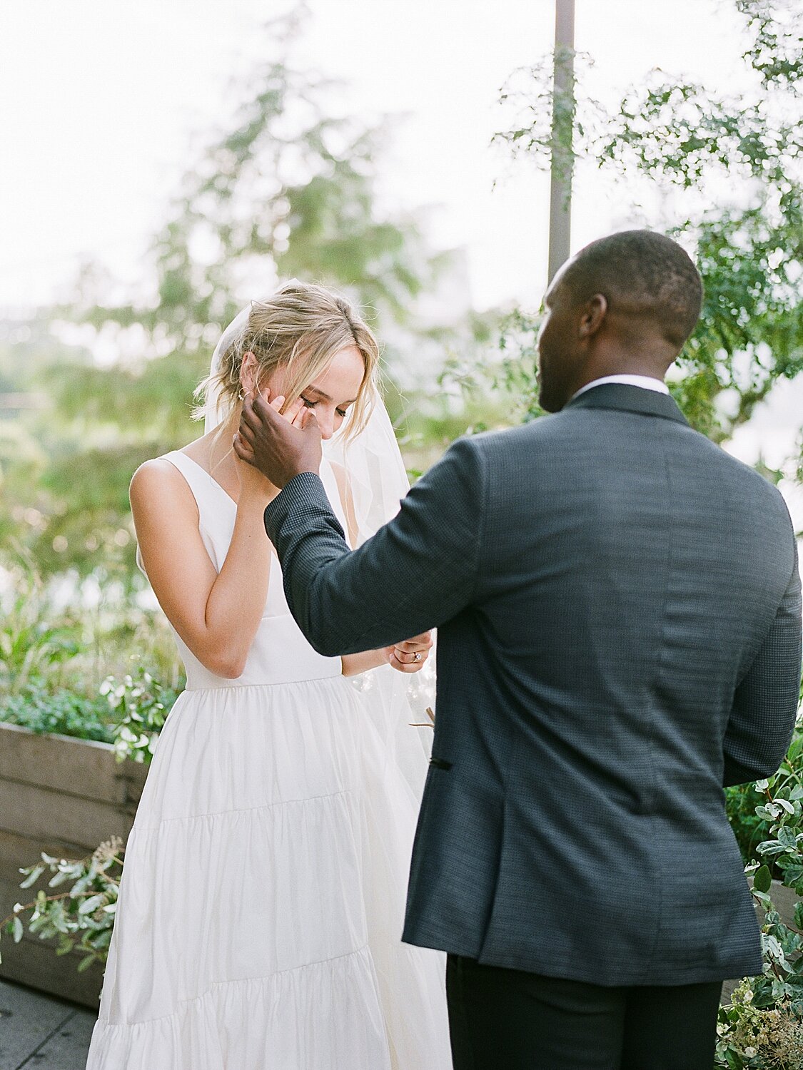 bride cries during Celestine wedding ceremony | Asher Gardner Photography | Intimate Ceremony in DUMBO New York