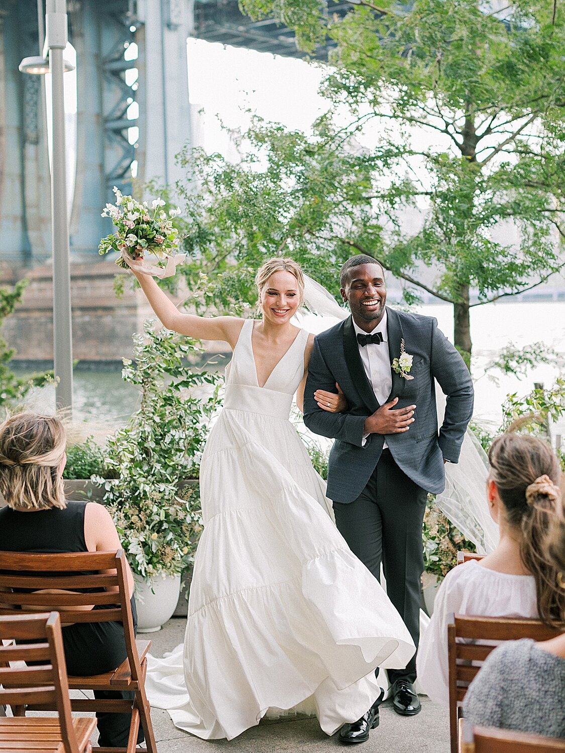 wedding ceremony with Brooklyn Bride in background | Asher Gardner Photography | Intimate Ceremony in DUMBO New York