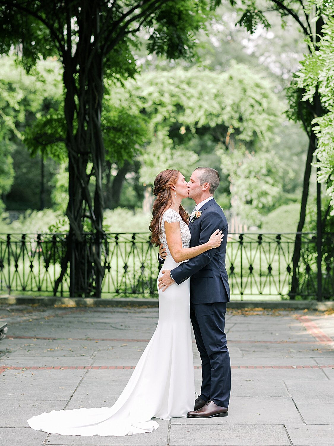 first kiss as husband and wife | Asher Gardner Photography | Elopement at the Central Park Conservatory Gardens