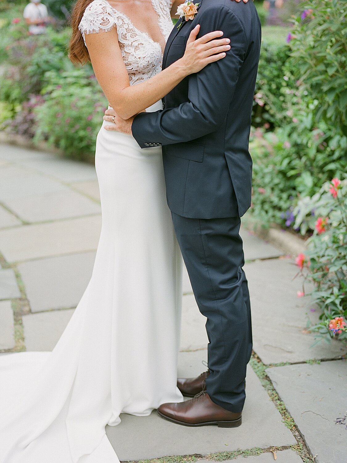 groom holds bride's waist during wedding photos | Asher Gardner Photography | Elopement at the Central Park Conservatory Gardens