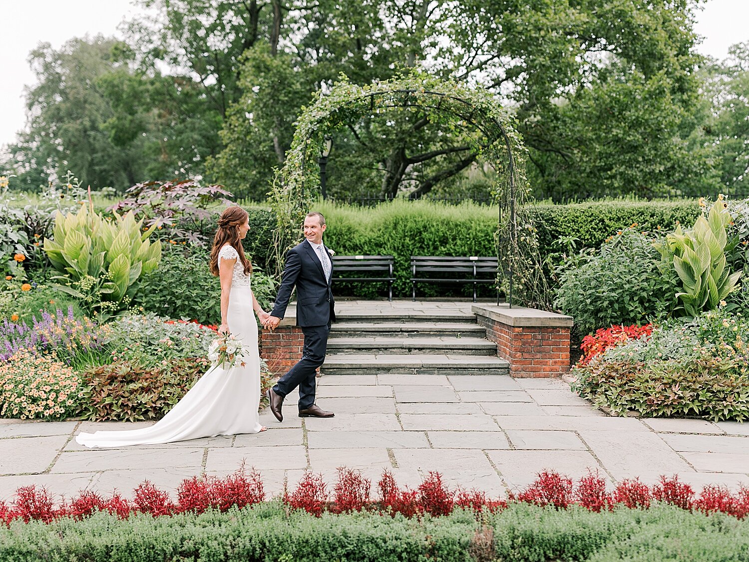 bride and groom walk through Conservatory Gardens | Asher Gardner Photography | Elopement at the Central Park Conservatory Gardens