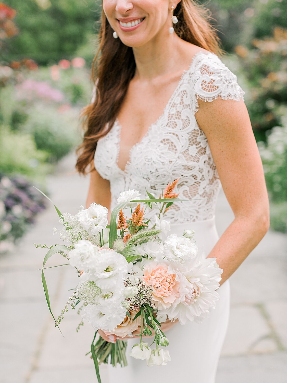 bride in lace detailed wedding gown for NYC wedding | Asher Gardner Photography | Elopement at the Central Park Conservatory Gardens