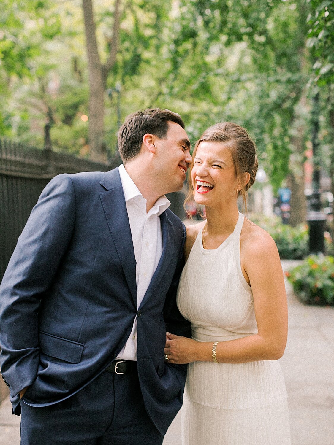 groom makes bride laugh during engagement photos | Asher Gardner Photography | Gramercy Park Engagement Session