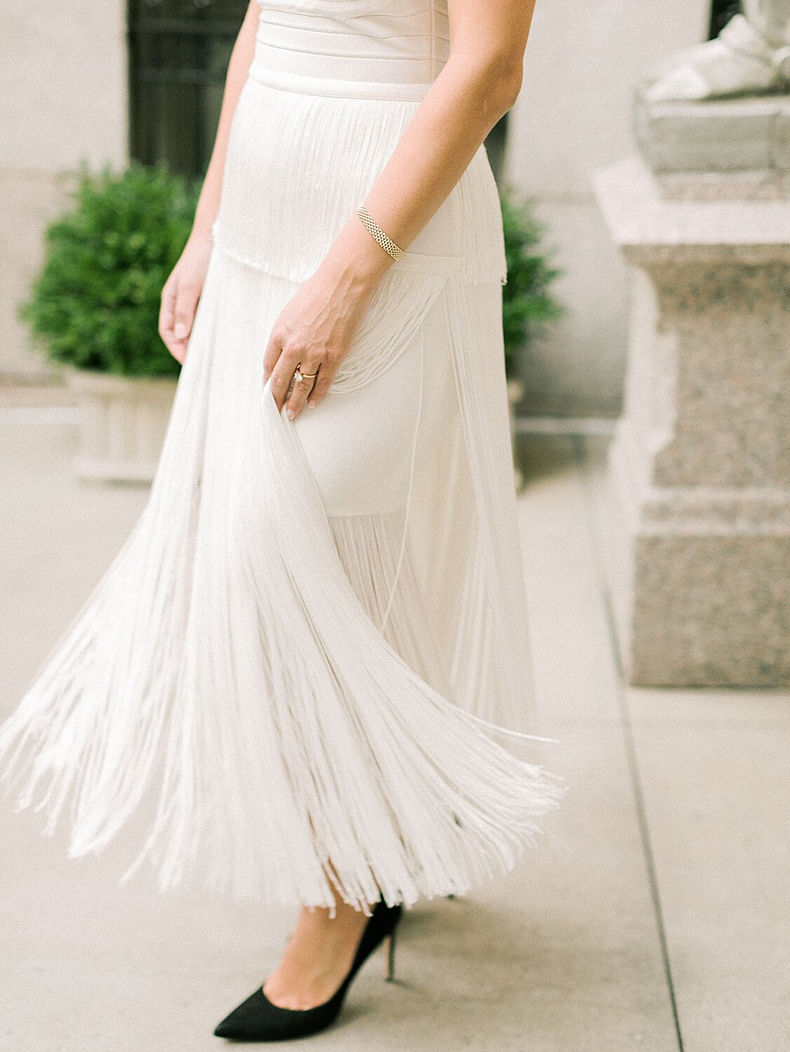 bride twirls dress during NY engagement session | Asher Gardner Photography | Gramercy Park Engagement Session