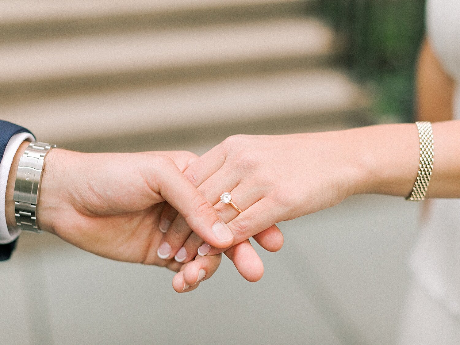 couple holds hands showing off engagement ring | Asher Gardner Photography | Gramercy Park Engagement Session
