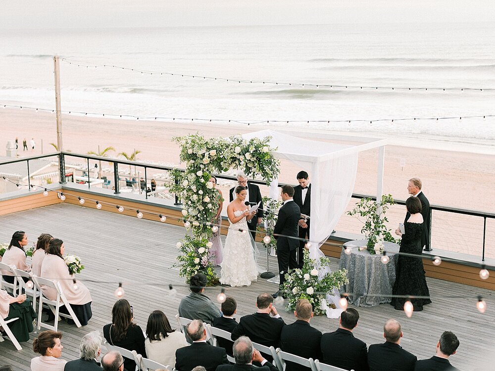 ceremony overlooking beach in Hamptons at Gurney’s Montauk Resort | Asher Gardner Photography shares top Tri-State Area wedding venues
