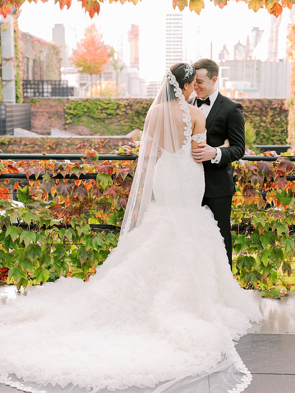 bride and groom pose during fall wedding at The Foundry | Tri-State area wedding venues photographed by Asher Gardner Photography