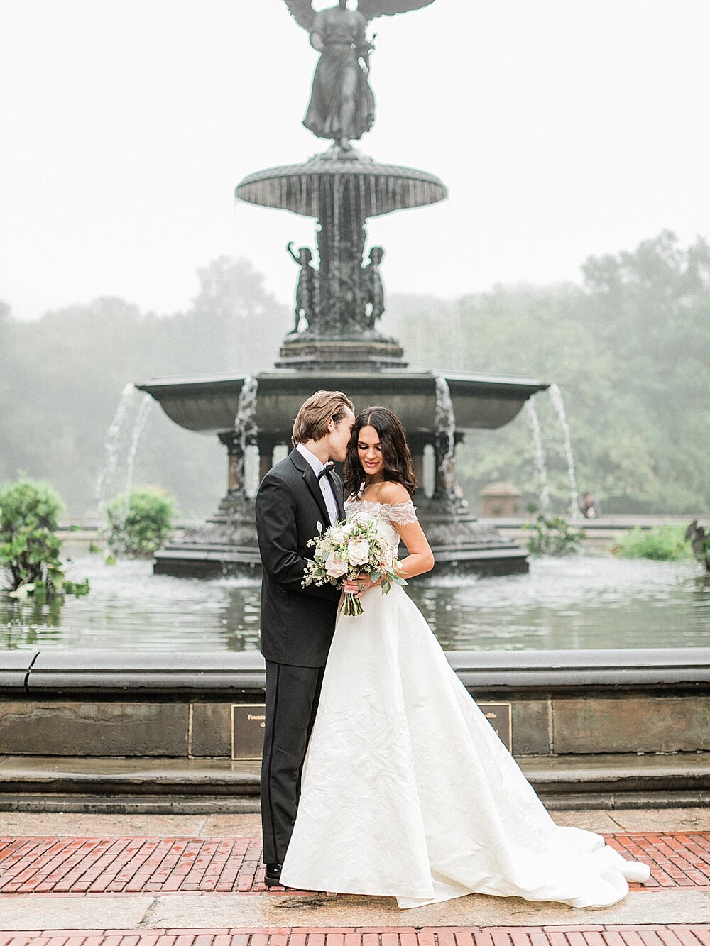 bride and groom pose by Bethesda Fountain | Tri-State area wedding venues photographed by Asher Gardner Photography