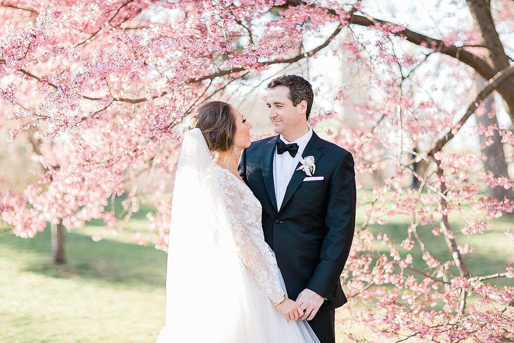 spring wedding portraits in Central Park by cherry blossoms | Tri-State area wedding venues photographed by Asher Gardner Photography