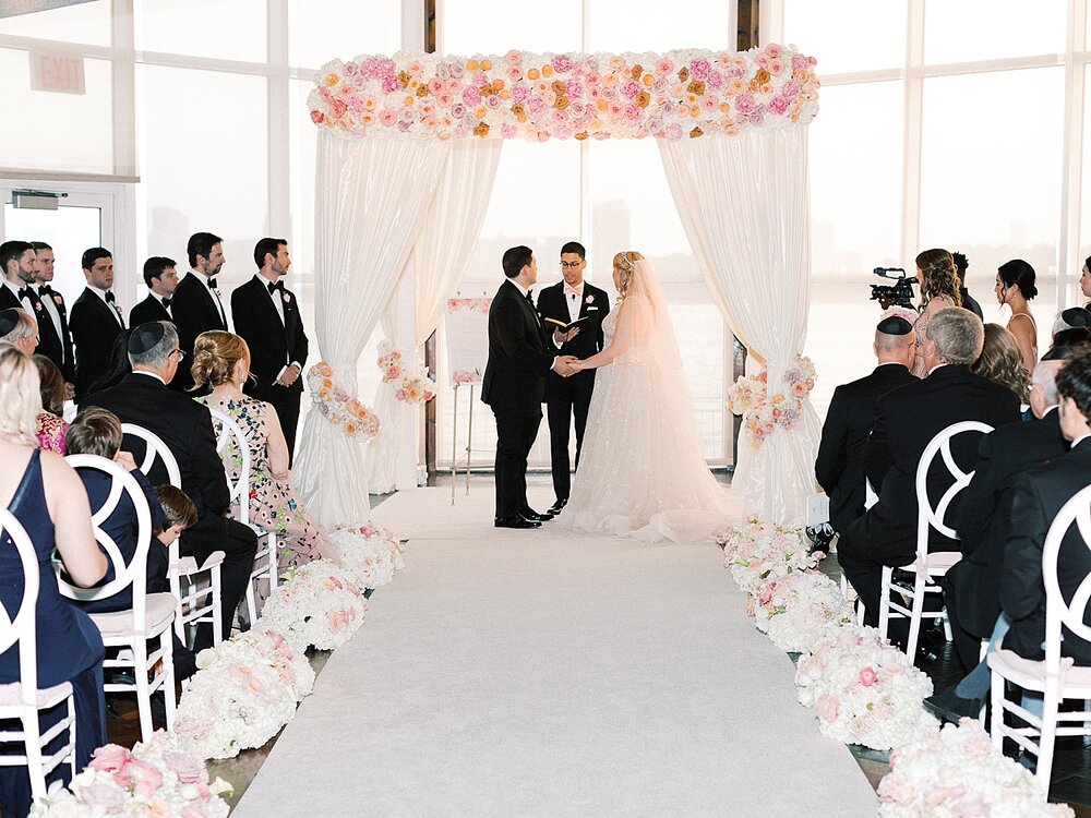 romantic wedding ceremony at Pier Sixty | Tri-State area wedding venues photographed by Asher Gardner Photography