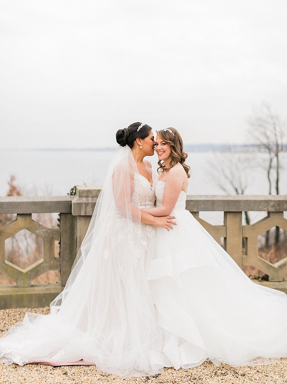 brides embrace on patio at Sands Point NY wedding venue | Tri-State area wedding venues photographed by Asher Gardner Photography