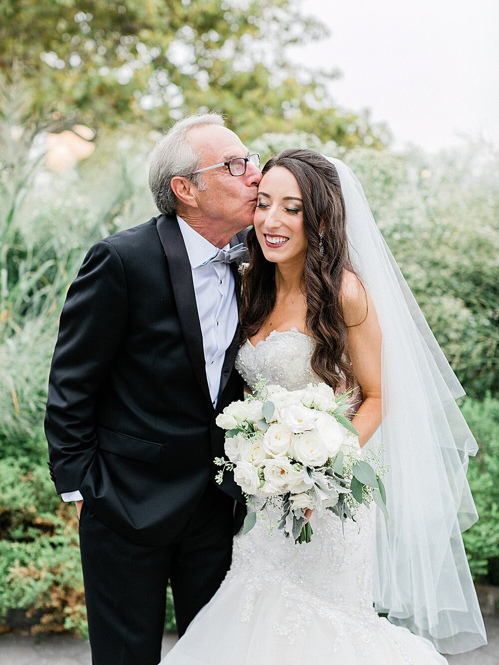 grandfather kisses bride during NYC wedding | Tri-State area wedding venues photographed by Asher Gardner Photography