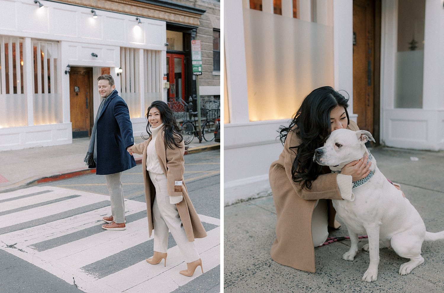 woman kneels down to kiss dog in crosswalk in Hoboken NJ