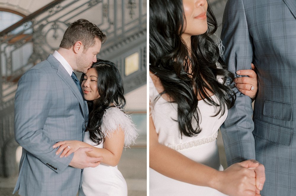 man and woman hug while woman holds his arm showing off engagement ring in New Jersey 