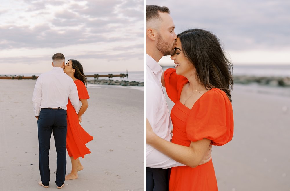 man kisses woman's forehead during engagement photos on beach at sunset 