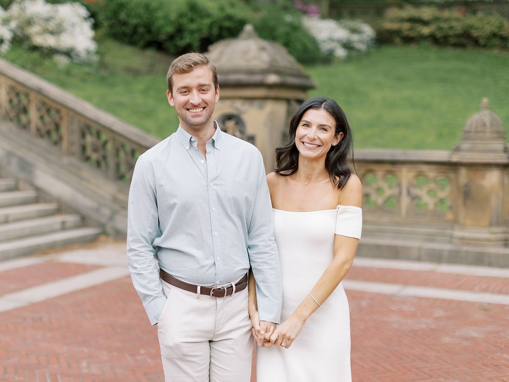 engaged couple holds hands during Central Park engagement session 