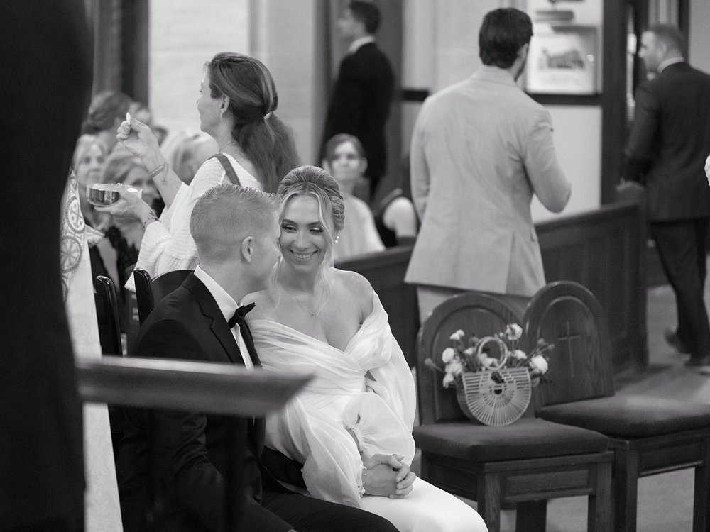 bride and groom laugh together during traditional church wedding on Long Island