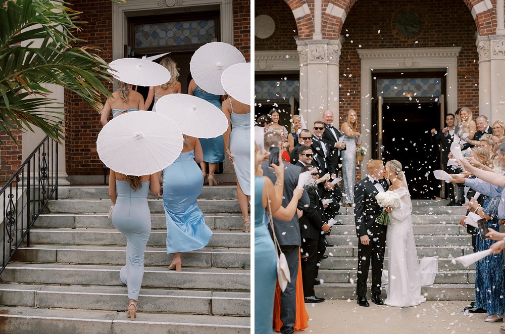 bride and groom kiss while wedding party and guests toss petals outside Long Island NY church