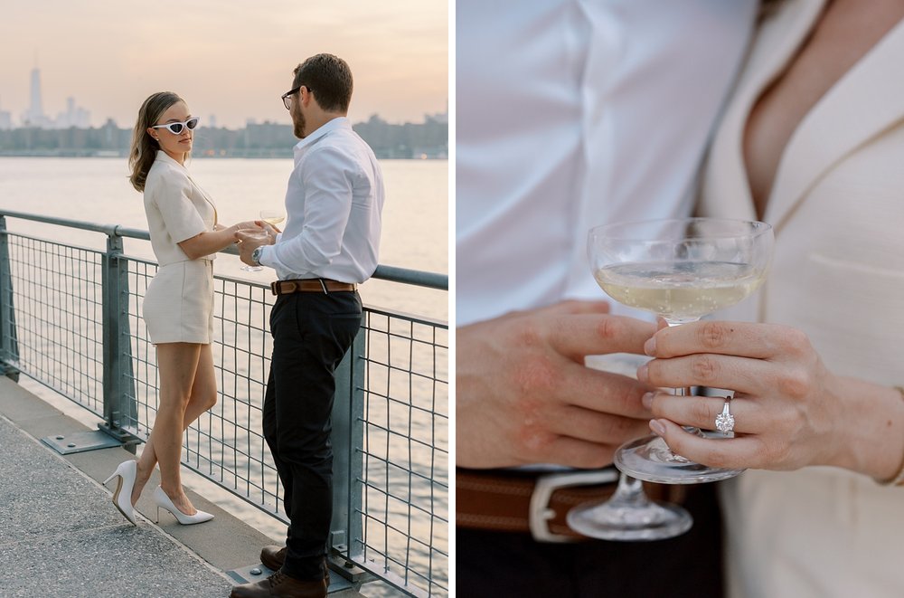 couple hugs toasting champagne glasses in NYC