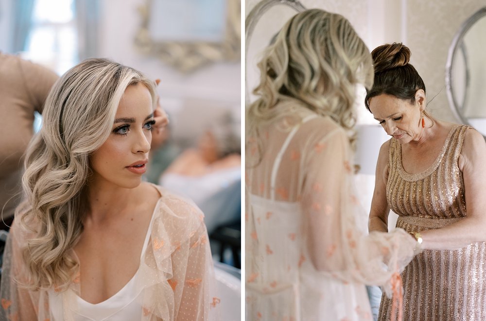 bride has hair done while mom helps her with bracelet for wedding day in NJ