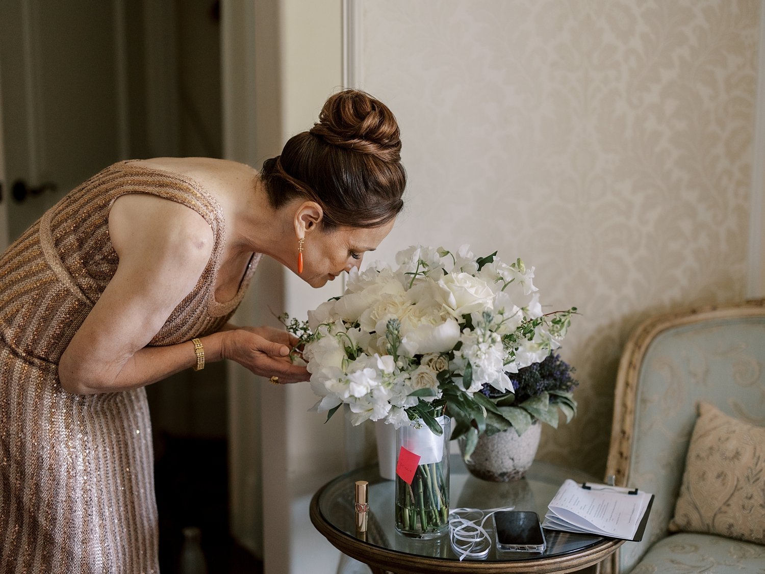 mother sniffs white roses before NJ wedding 
