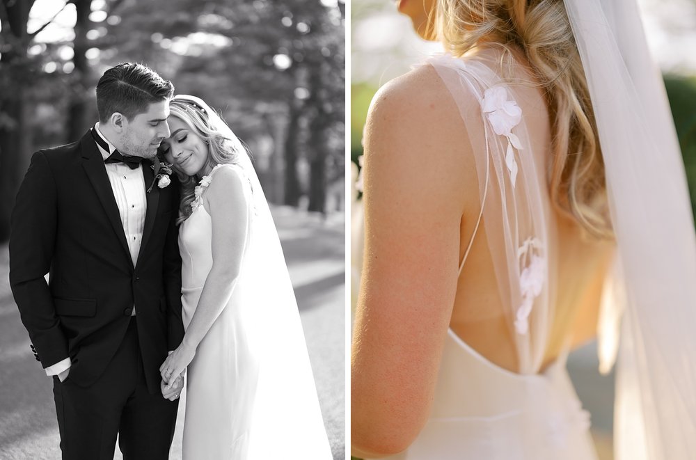 bride leans into groom and shows off back of lace on wedding gown
