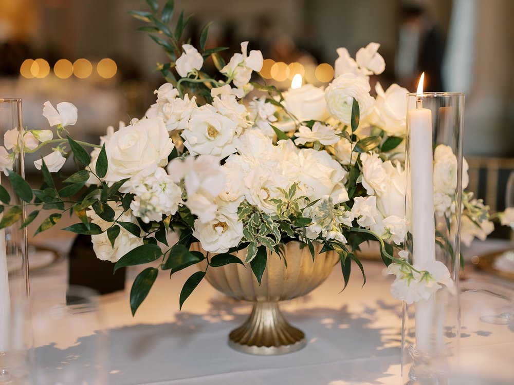 wedding reception centerpiece with white flowers 