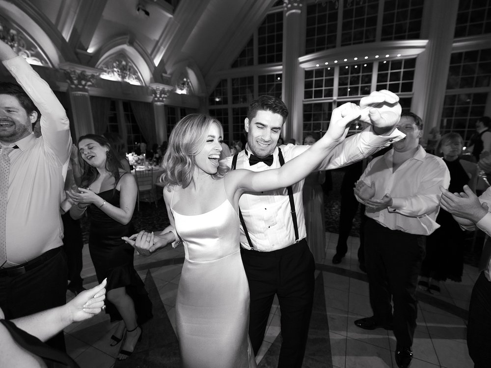 newlyweds dance and drink at reception at the Ashford Estate