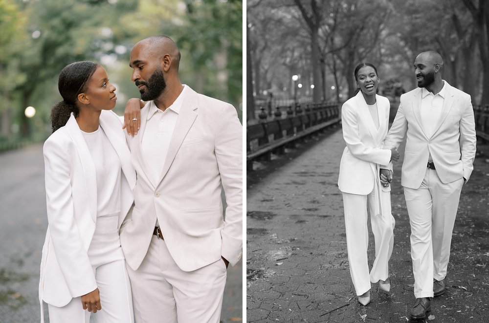 married couple holds hands walking down path during rainy Central Park anniversary portraits 