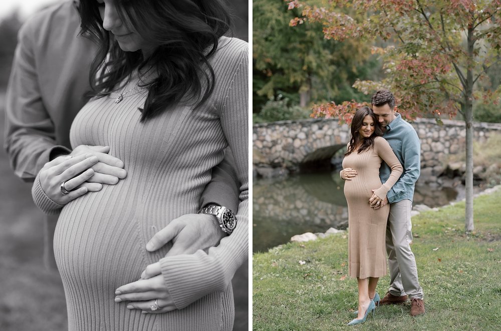 mom and dad hold baby bump during fall maternity session in Binney Park