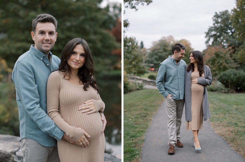 couple walks through park during fall maternity session