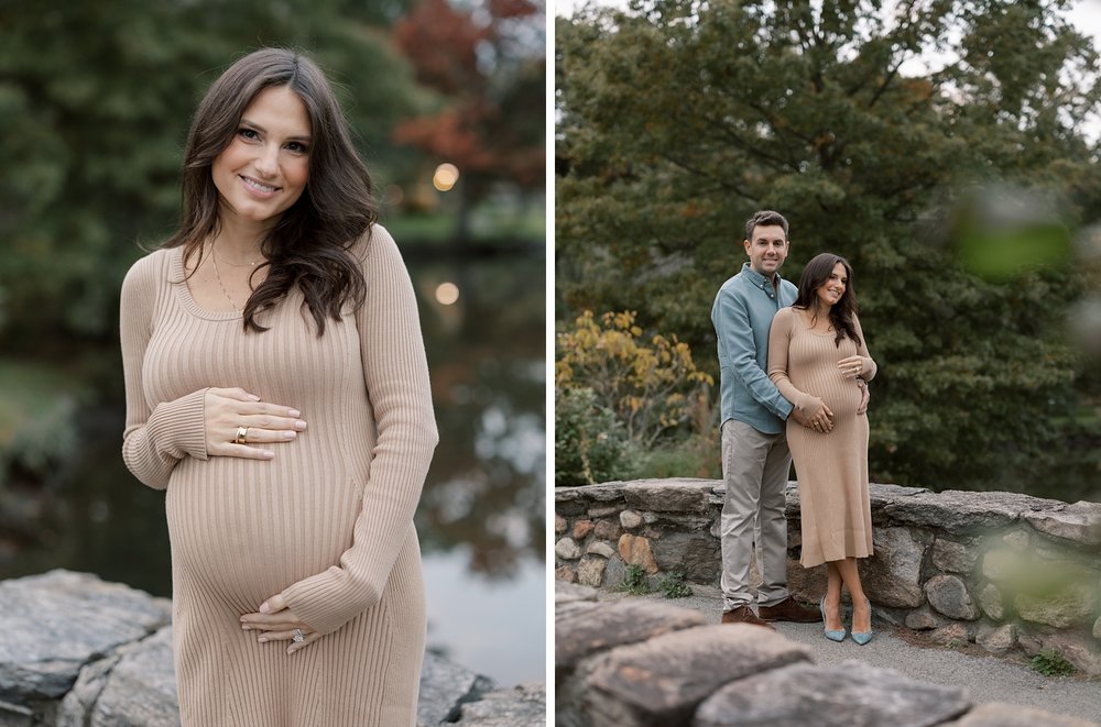 woman holds baby bump in sweater dress during fall maternity session in Binney Park
