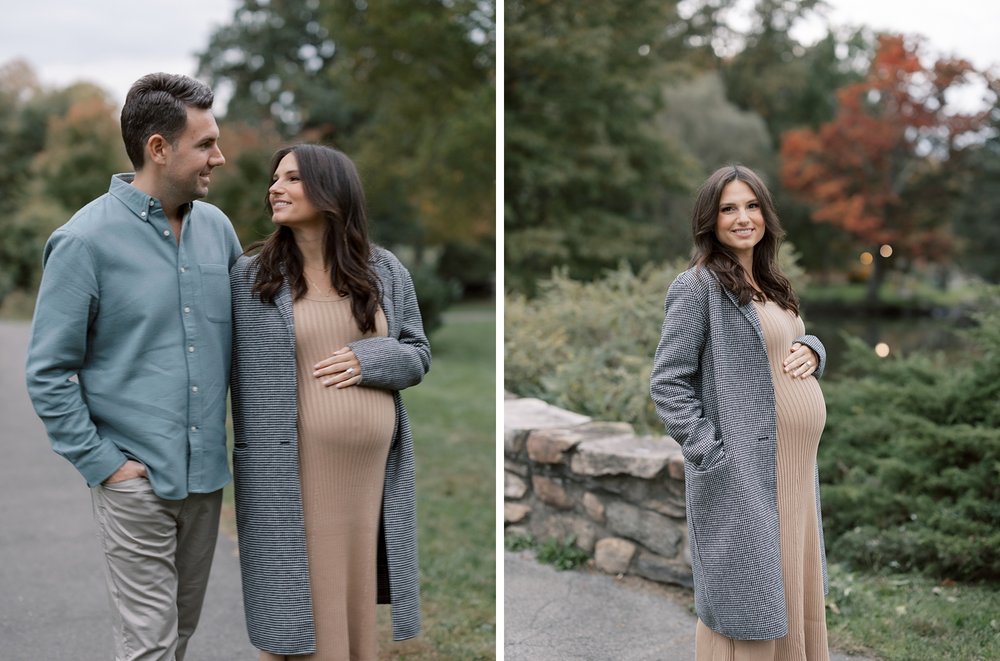 married couple walks though Binney Park while mom holds baby bump