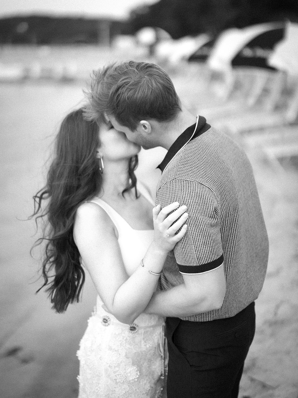 couple kisses during engagement session at the Pridwin on Shelter Island NY
