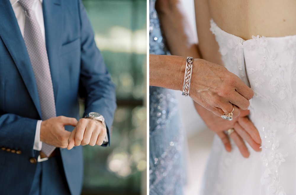 groom adjusts watch and bride shows off buttons on back of dress