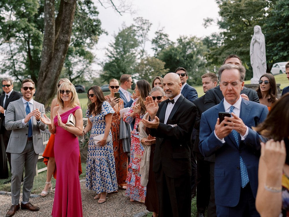 guests mingle during cocktail hour on the patio at Pendry Natirar