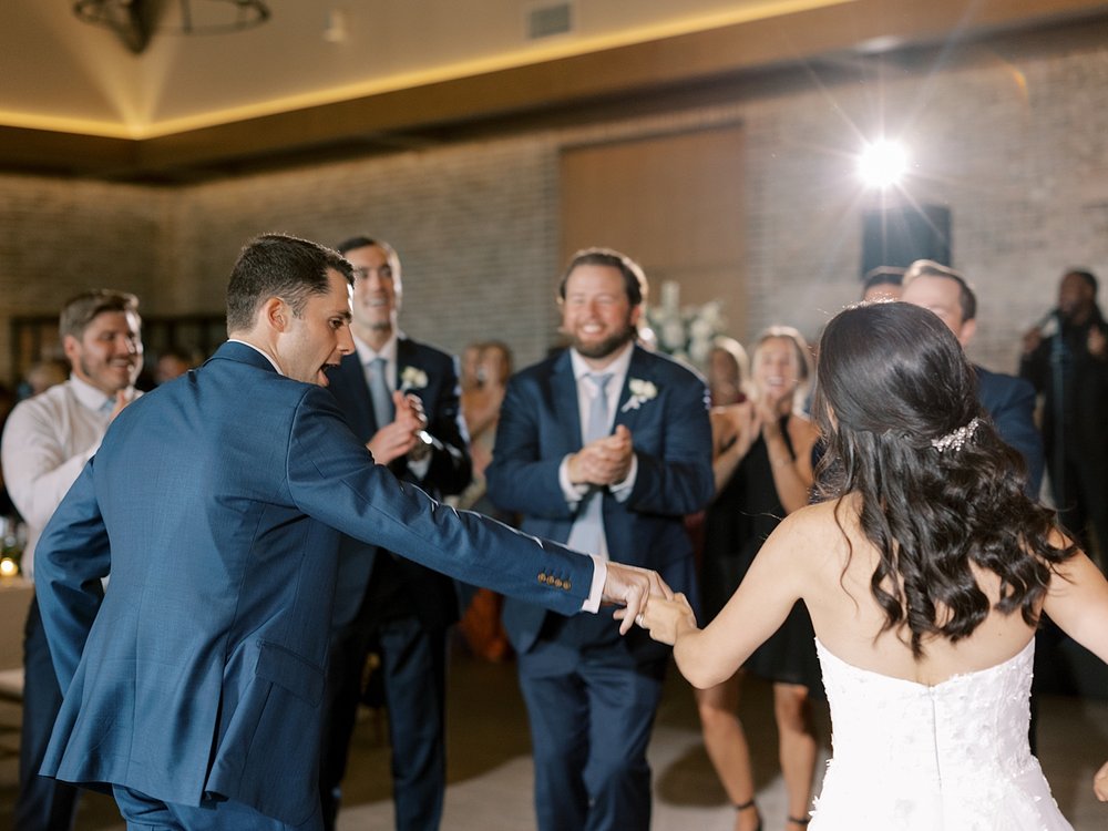 bride dances with dad and brother during Pendry Natirar wedding reception