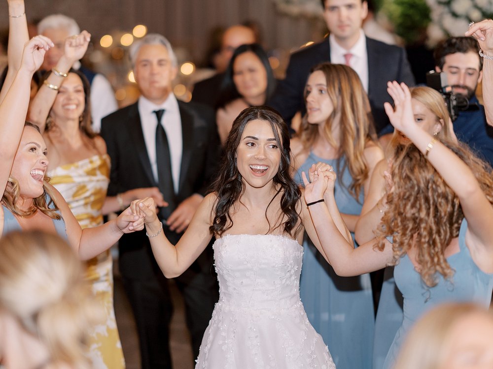 guests dance during Pendry Natirar wedding reception with newlyweds 