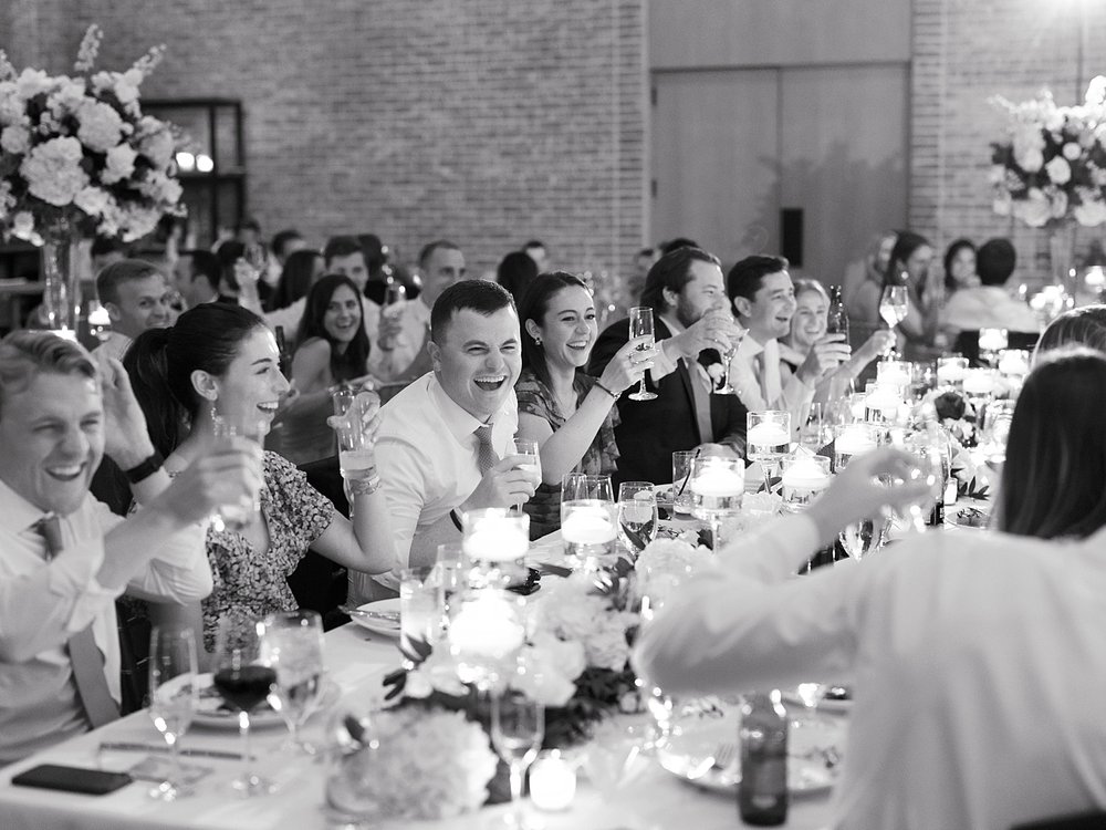 guests listen to toasts during New Jersey wedding reception 