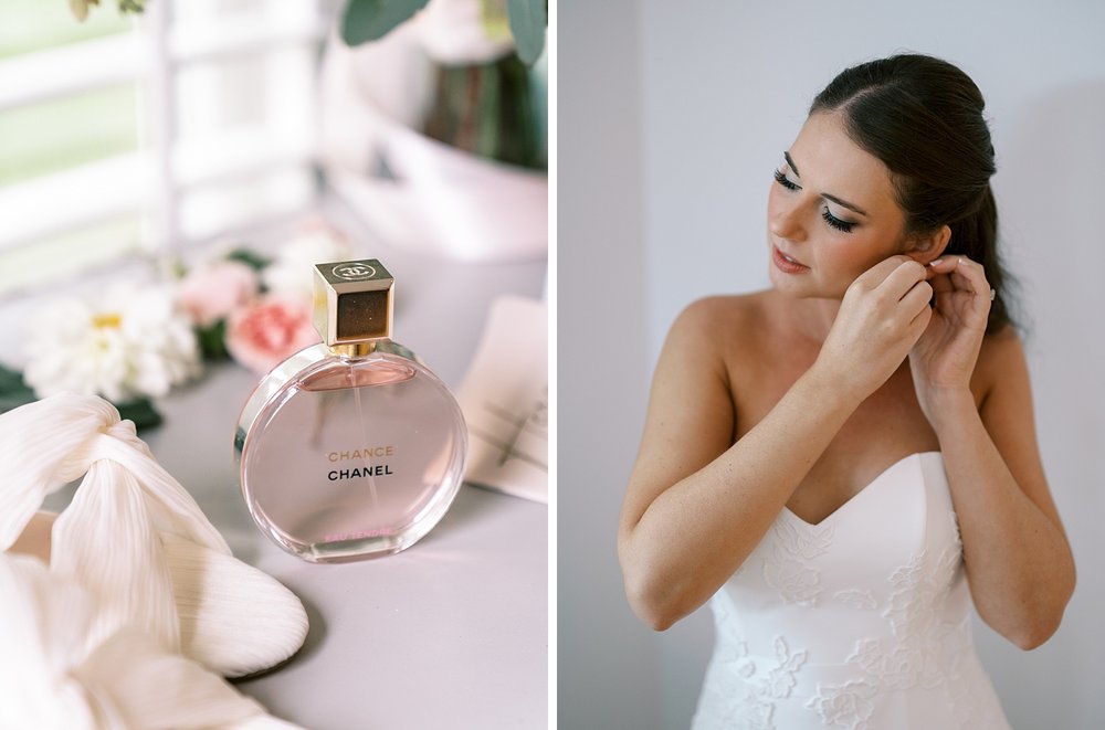 bride's perfume sits on window sill while bride adjusts earrings 