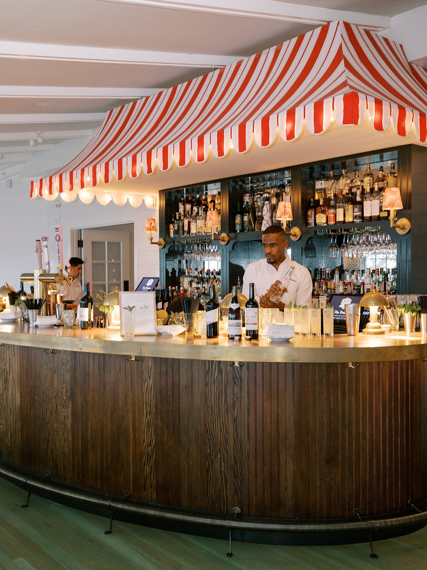 bartender mixes drinks at the Pridwin