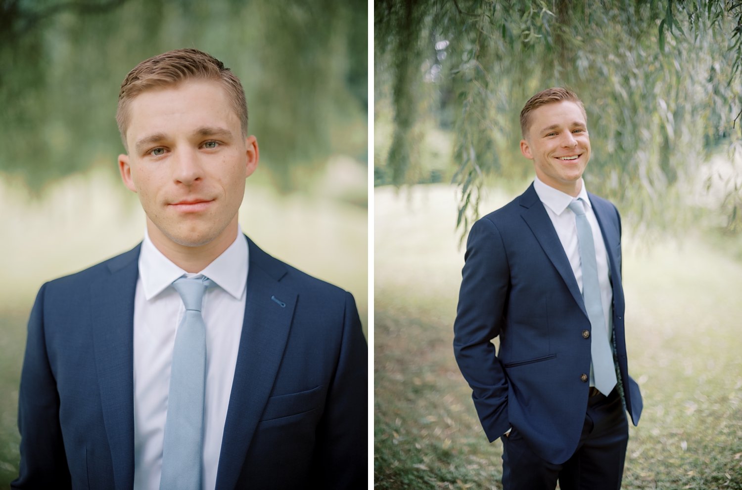 groom in blue suit smiles under willow tree outside the Buttermilk Inn &amp; Spa