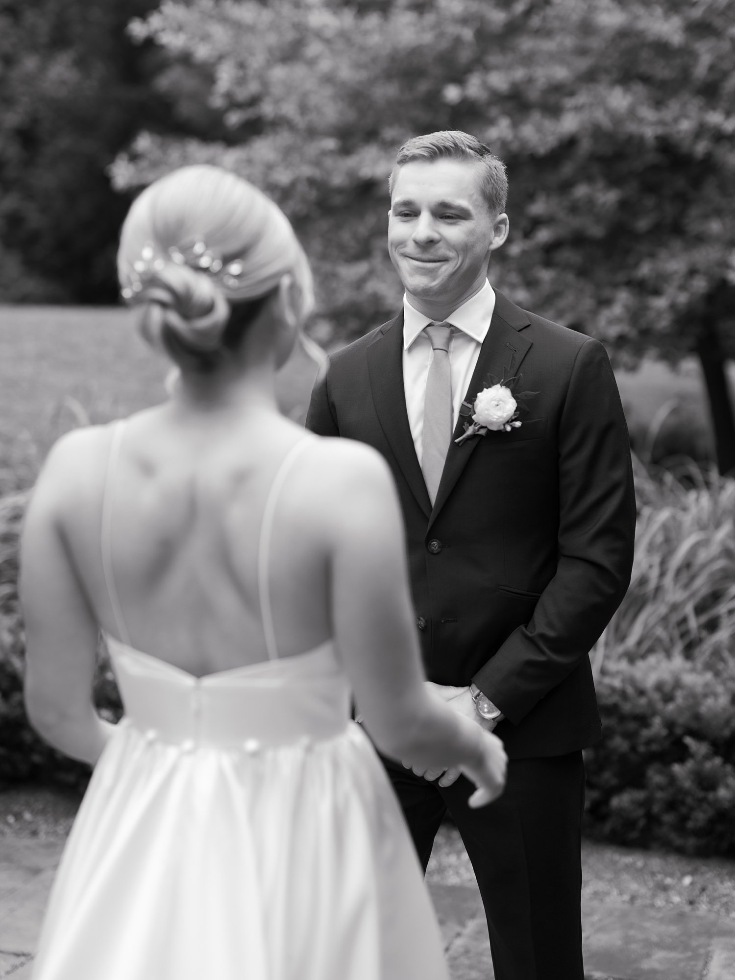 bride and groom meet for first look outside the Buttermilk Inn &amp; Spa