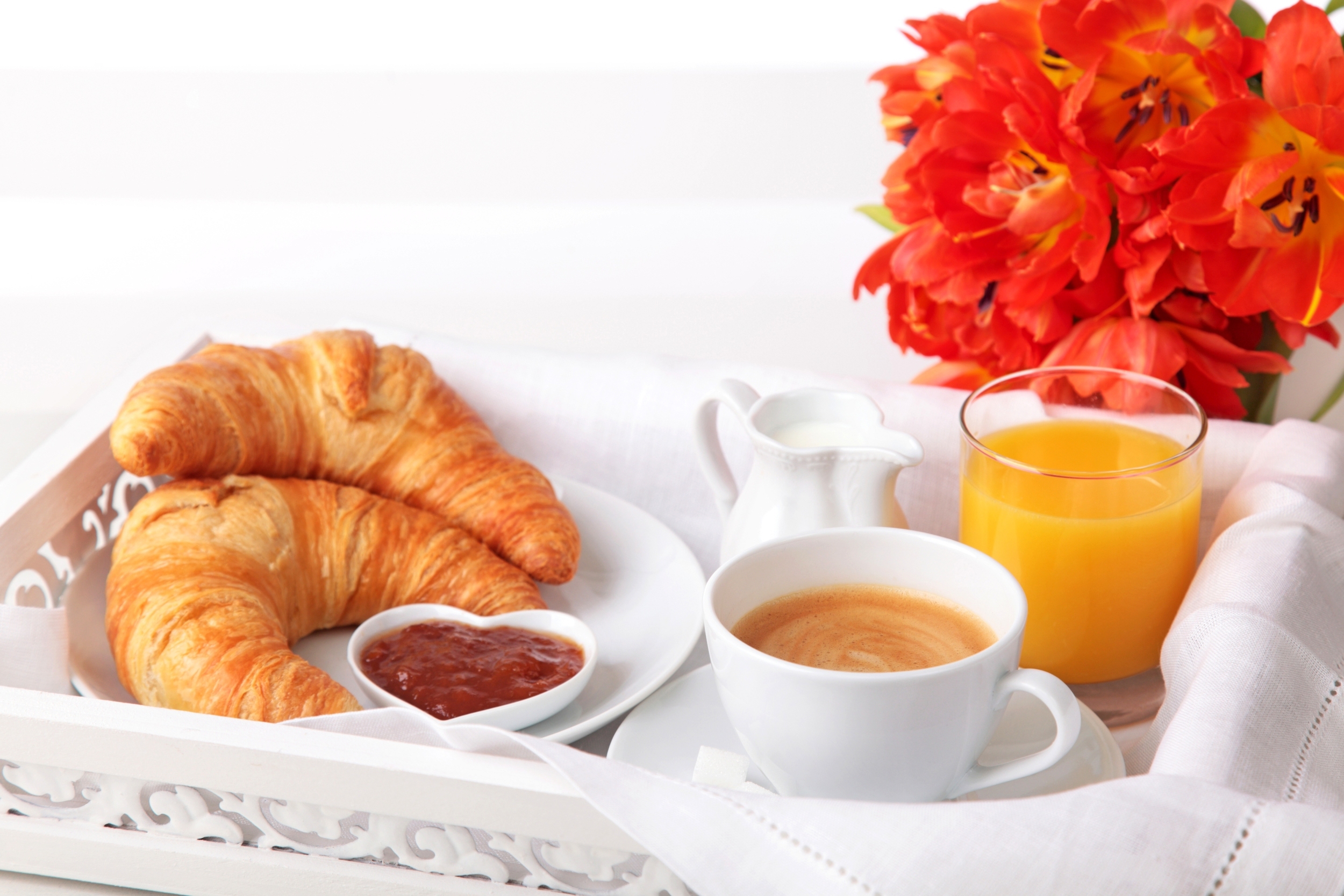 breakfast-croissants-bagels-plate-juice-orange-juice-jam-coffee-cappuccino-milk-cups.jpg