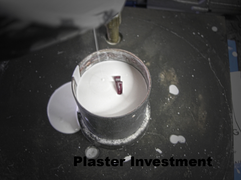 Wax covered with plaster investment