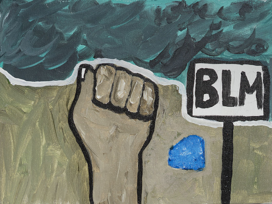 A painting of a raised fist next to a sign with the letters 'BLM' on it, against a background of dark clouds and a beige ground with a small blue patch.