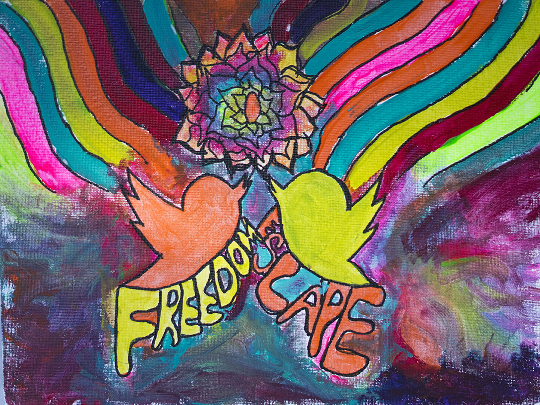 A colorful, psychedelic artwork featuring two cats, one orange and one green, with the word 'Freedom' and the other word 'Love' incorporated into the design, surrounded by rainbow stripes and a vibrant rainbow-colored flower at the top.