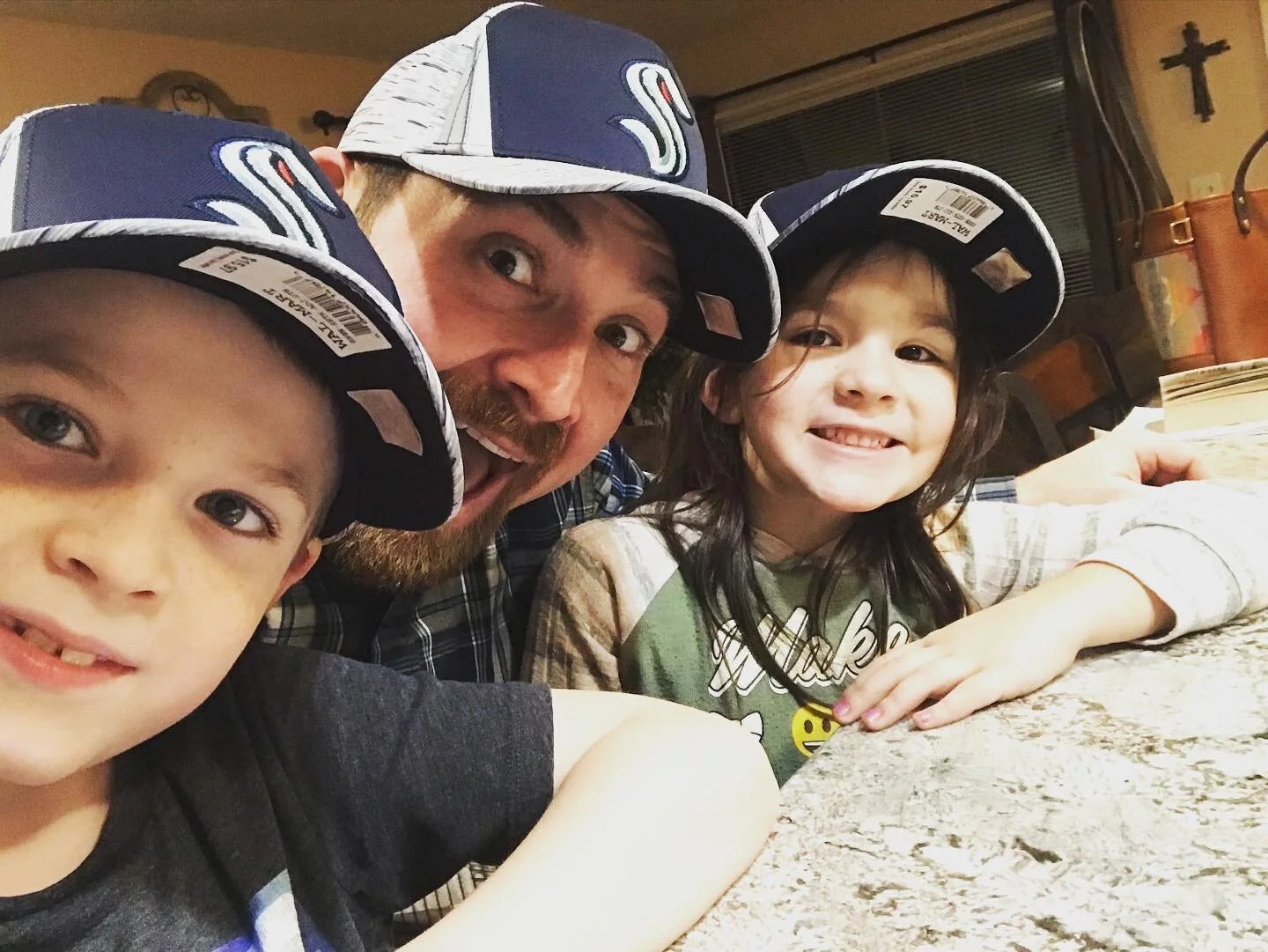 The kids and daddy have #matching #hats! Go #kracken!