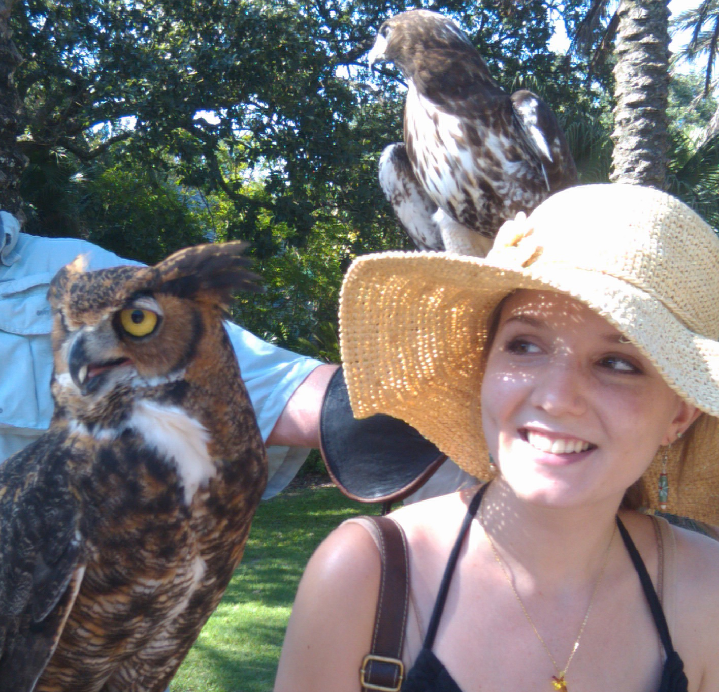 Vivian is the non-feathered individual in the photo.